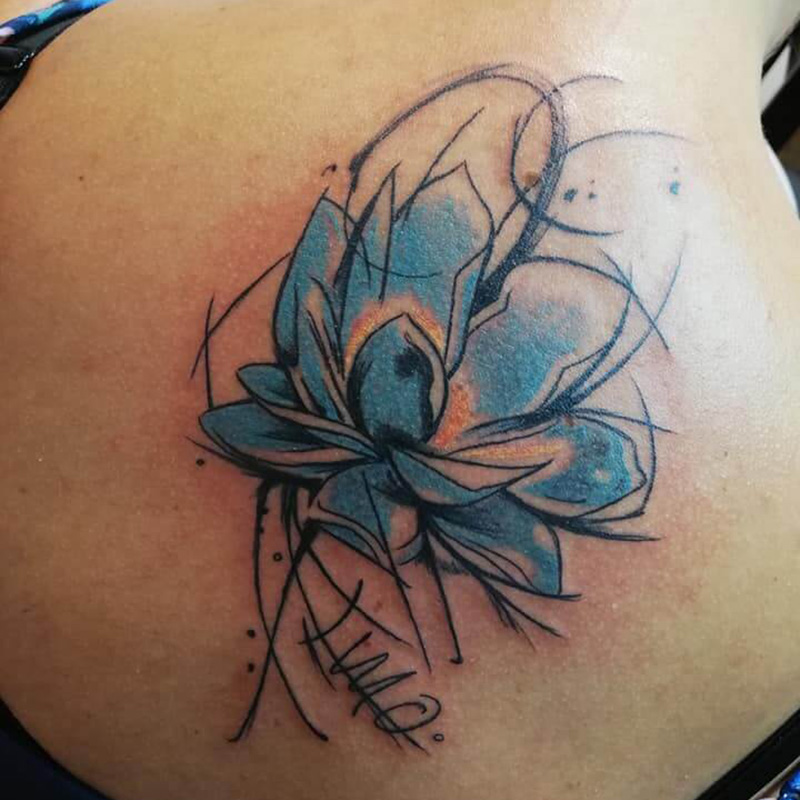 accueil tatouage fleur bleu so tattoo les essarts 85